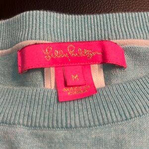Lilly Pulitzer light blue/aqua sweatshirt. Crochet detail on sides